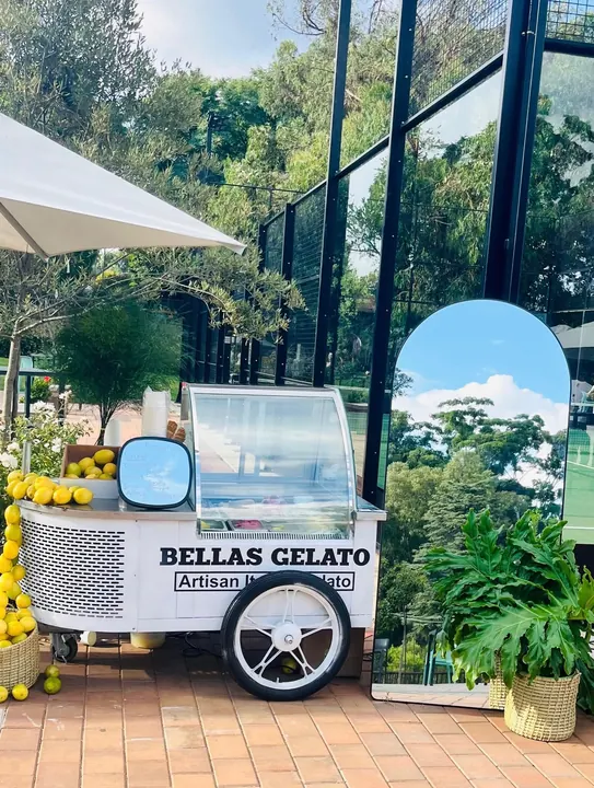 Guest at a padel event with the gelato cart
